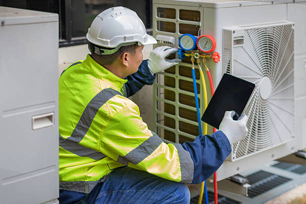 Professional Ductwork Repair technician working in White Hall, WV